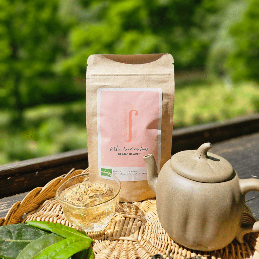 Breton white tea sachet Filleule des Fées with a terracotta teapot.